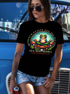 Comfort Colors C1717 black t-shirt with colorful Zen Nootropics frog design, worn by woman with sunglasses and denim shorts outdoors